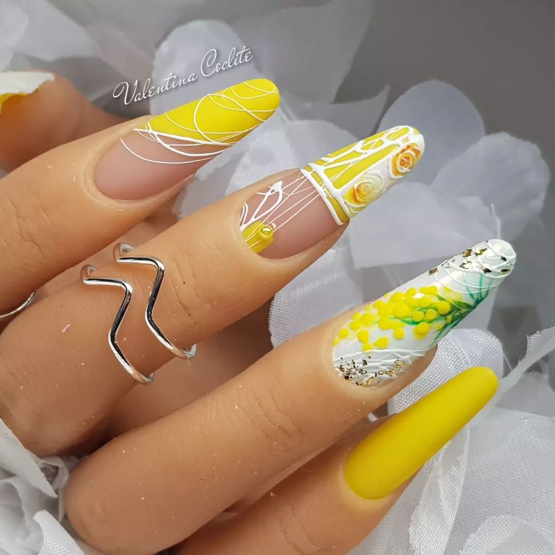 Yellow and White Nail Polish with Flowers on Almond Nails