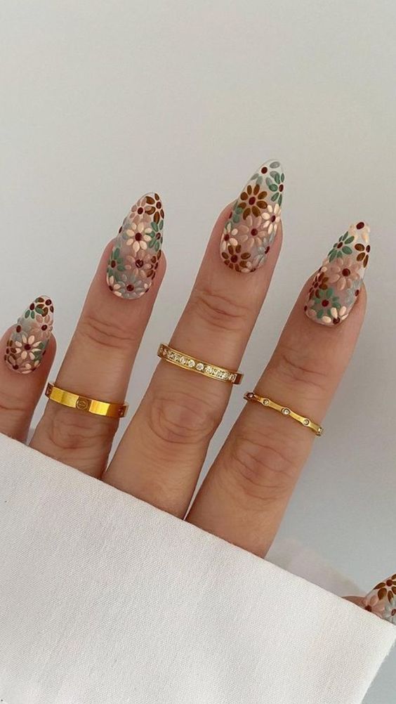 Lots of Flowers on Almond Nails