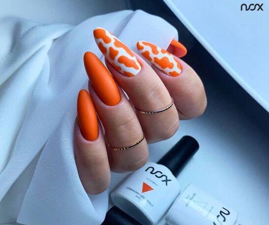 Orange Animal Print Nail Art on Almond Nails