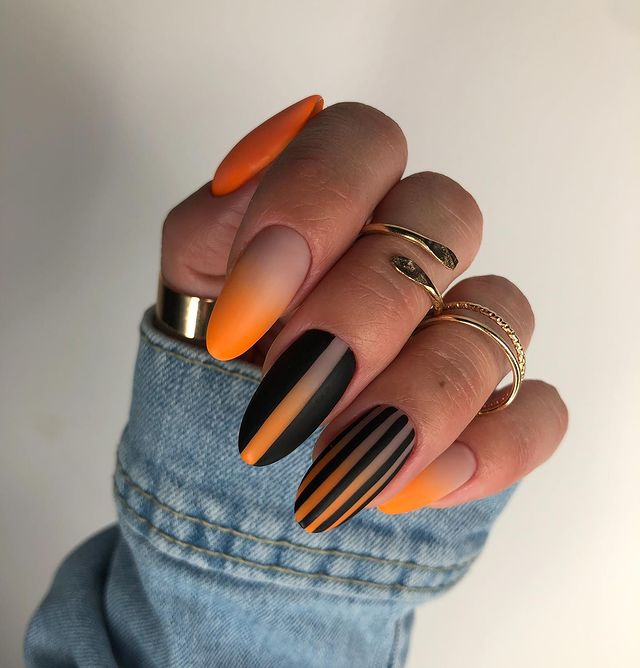 Orange and Black Combination of Nail Colors on Almond Nails