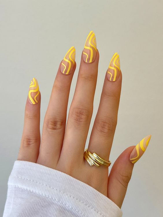 Abstract Yellow Nail Art on Almond Nails