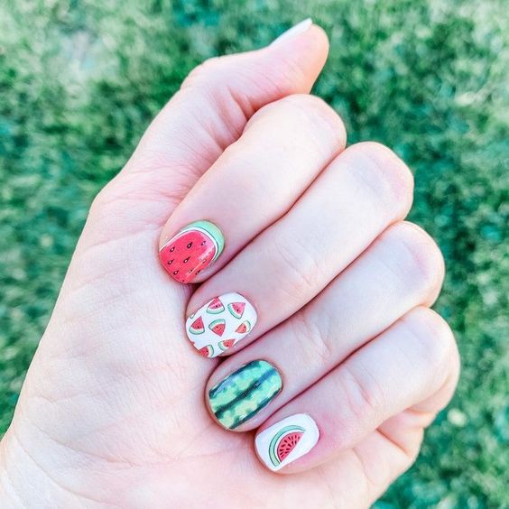 These are the cutest watermelon nail art designs and watermelon nails gel ideas! These fun designs include all the best green and red watermelon nail designs, cute short fruit nails, cute short watermelon nails and other watermelon nail ideas! If you’re looking for cute spring nails or cute summer nails, this is the mani to go for!