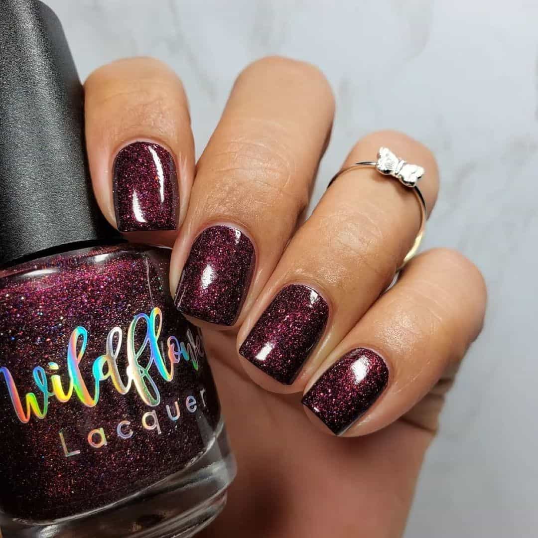 Galaxy Burgundy Nail Design